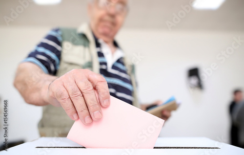 Man casts his ballot at elections