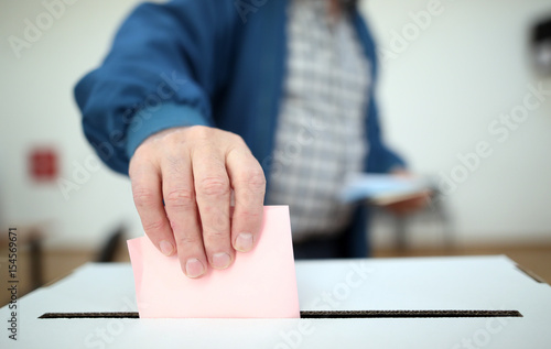 Man casts his ballot at elections