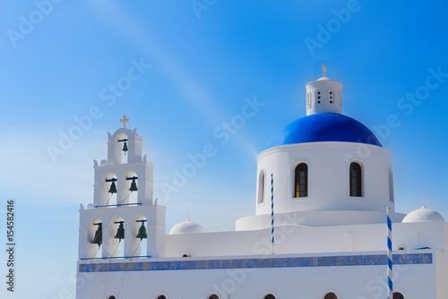 The Orthodox Church Belltower and dome in Oia, Santorini, Greece