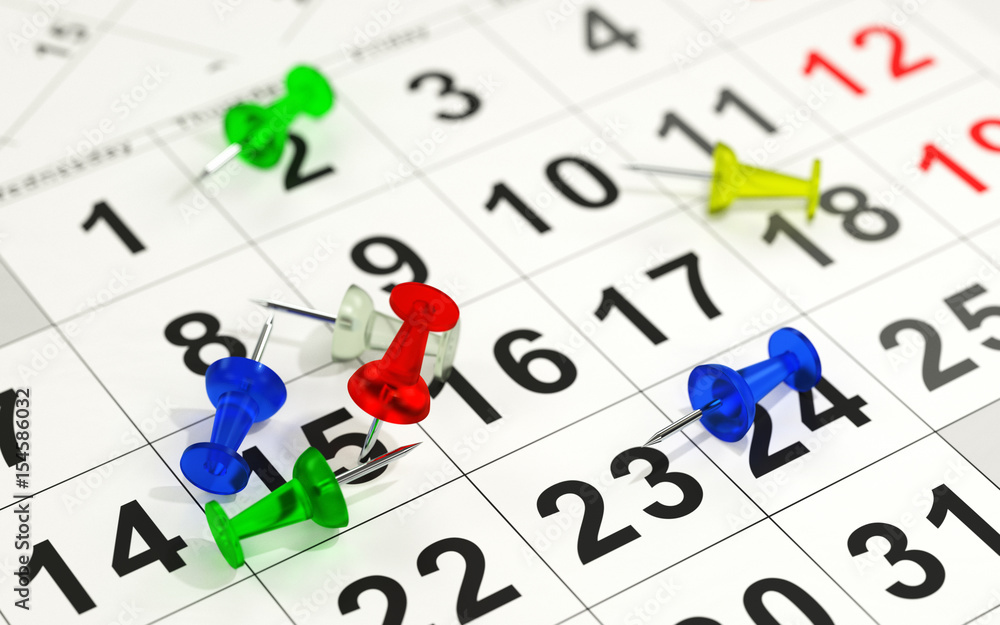Red pin marking the 15th on a calendar Red pin marking the 15th on a calendar