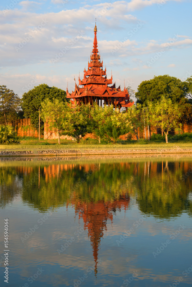One of the towers of the citadel of the Old City in the evening light. Mandalay, Myanmar