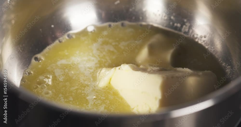 Still shot of preparing bechamel sauce melting butter, 4k 60fps prores footage Still shot of preparing bechamel sauce melting butter, 4k 60fps prores footage