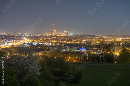 Panoramic view of Crakow city with chimneys - nowa huta by night