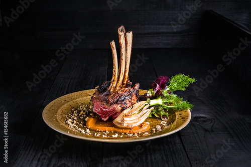 Fototapeta Naklejka Na Ścianę i Meble -  Gourmet Main Entree Course Grilled rack of lamb