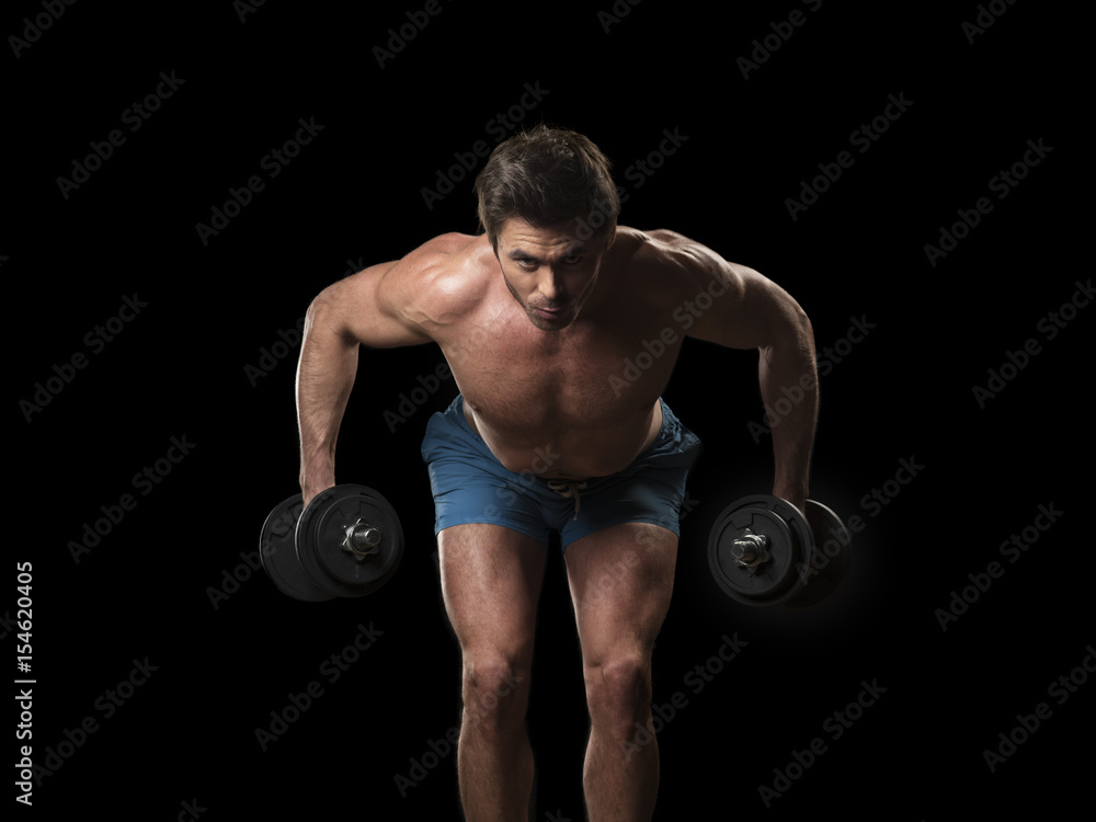 Muscular man with dumbbells
