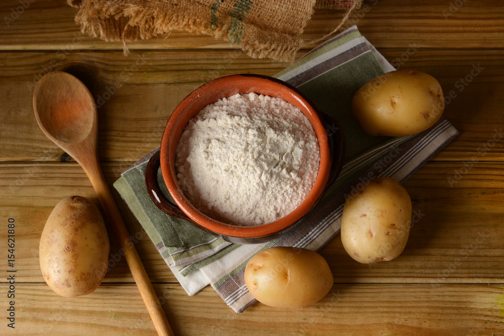 potato starch in terracotta bowl potato starch in terracotta bowl
