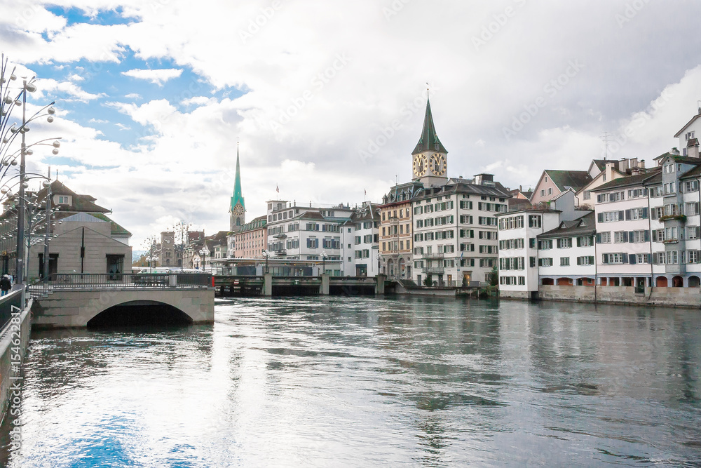 the historic city center of zurich with famous fraumunster church