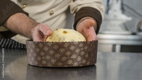 preparazione dell'impasto del panettone in una pasticceria artigianale photo