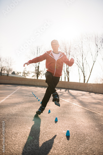 Rollerskater, rollerskating trick exercise in park © Nomad_Soul