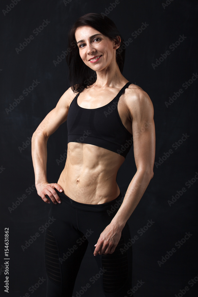 Obraz premium Portrait of middle-age sportswoman