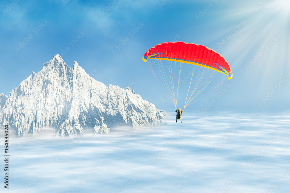 Freestyle solo paragliding over clouds against mountain peak Freestyle solo paragliding over clouds against mountain peak