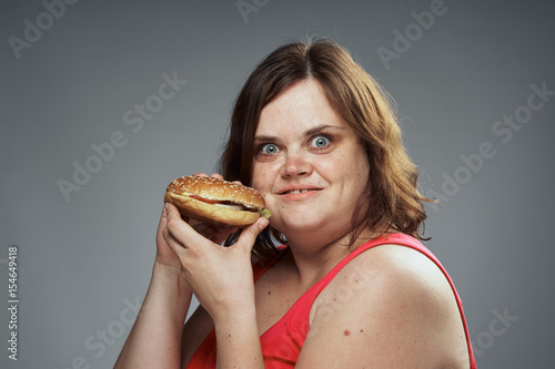 happy woman with a hamburger