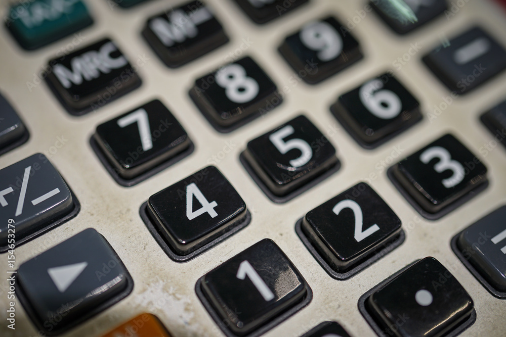 Close up macro view of calculator keypad as financial concept Close up macro view of calculator keypad as financial concept
