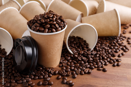 Coffee beans and coffee cups