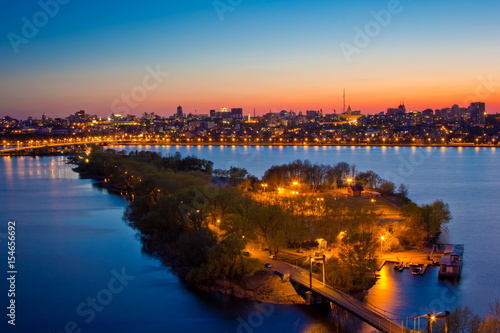 Evening sunset in Voronezh. View to Voronezh water reservoir and island connected with bridges