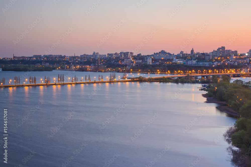 Evening sunset in Voronezh. View to Voronezh water reservoir and Chernavsky bridge