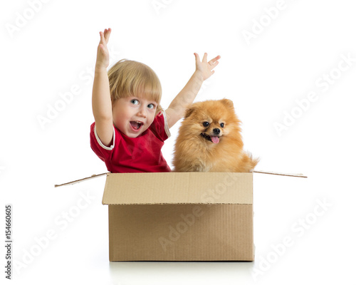 Smiling child with hands up...