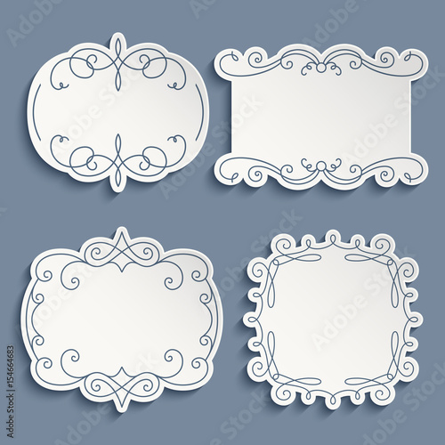 Set of cutout paper frames with flourishes