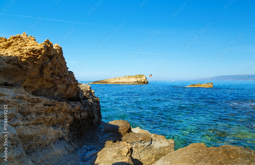 Rocks on the coast of Cretan Sea near Hersonissos, Crete, Greece.