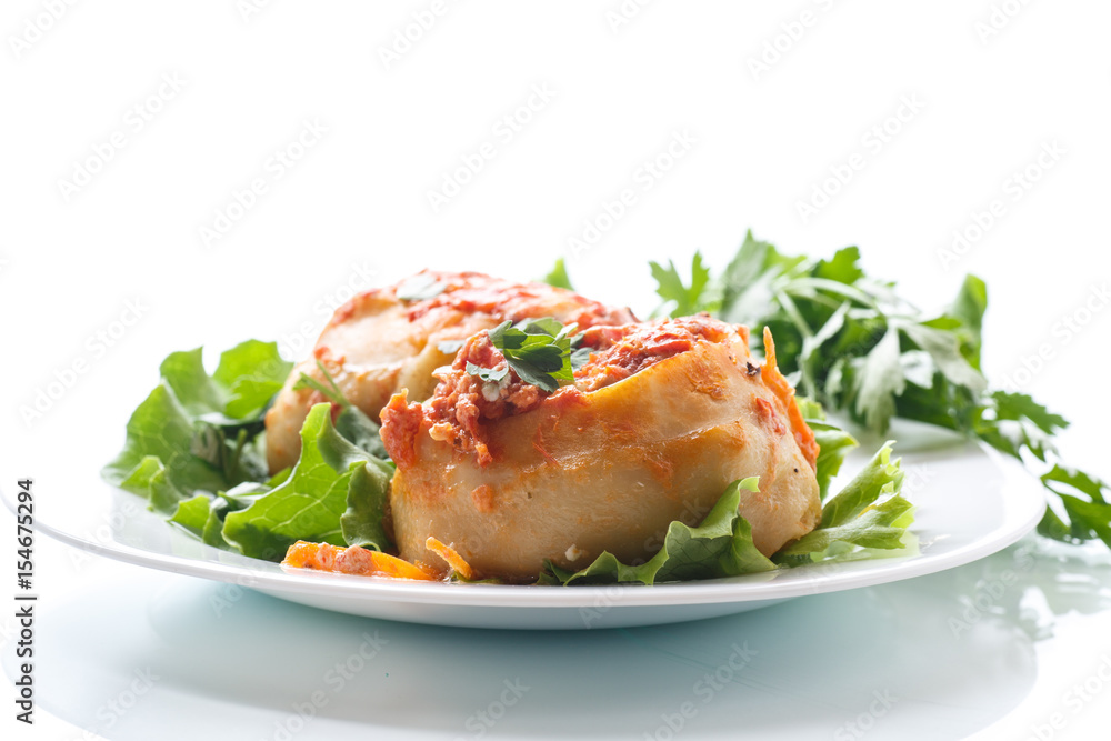 Traditional stewed manti in tomato sauce Traditional stewed manti in tomato sauce