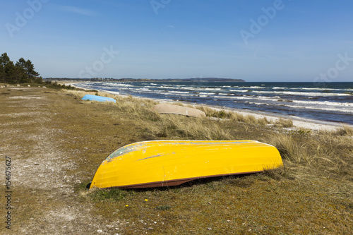 Fototapeta Naklejka Na Ścianę i Meble -  Boats lying on Danish Baltic Sea Beach