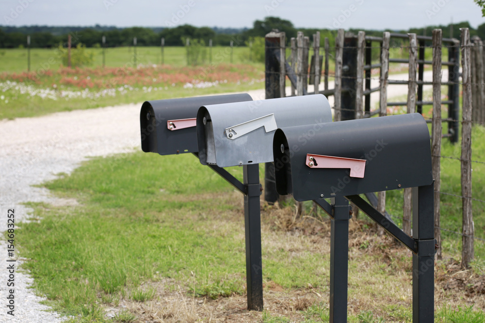Three old mail boxes at farm country road Three old mail boxes at farm country road