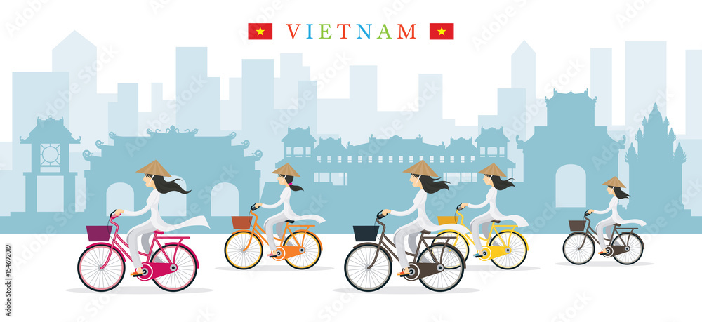 Vietnamese Women with Conical Hat Ride Bicycles, Landmarks Background Vietnamese Women with Conical Hat Ride Bicycles, Landmarks Background