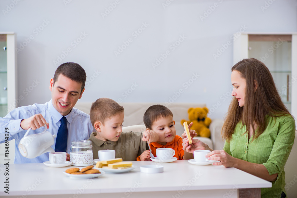 Happy family having breakfast together at home Happy family having breakfast together at home