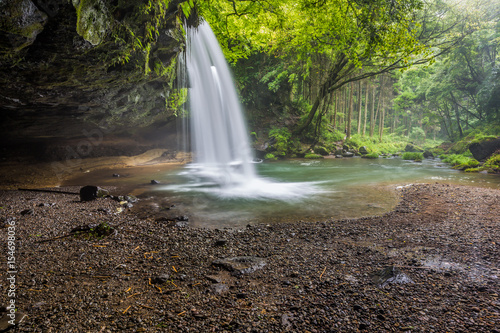 Inside Nabegataki waterfalls in Kumamoto, Kyushu, Japan