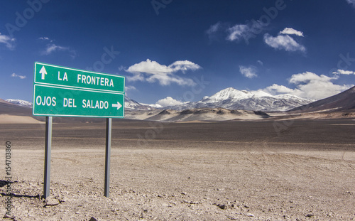 road sign near ojos del salado volcano in chile