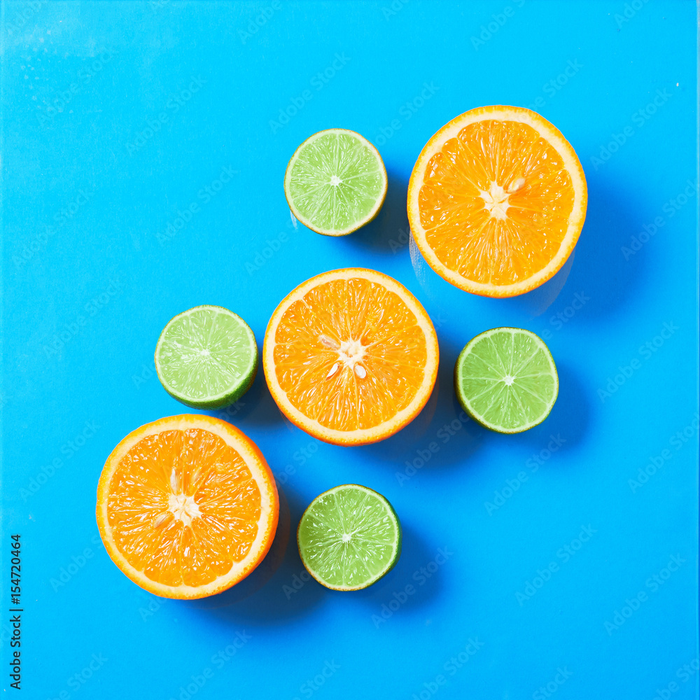 Concept of fresh fruit background of orange and lime Concept of fresh fruit background of orange and lime