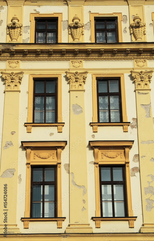 front of and old yellow house with windows, Olomouc, Czech Republic