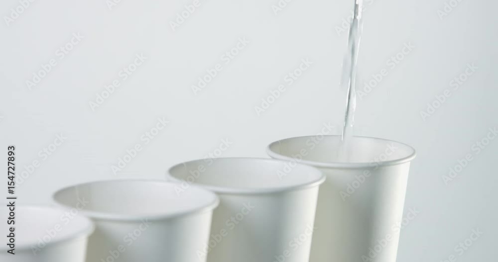 water fill a last one paper cup in a raw Stock ビデオ | Adobe Stock
