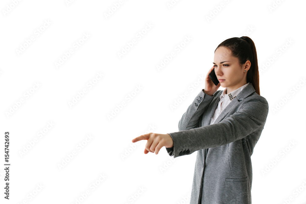 Businesswoman talking on the phone and giving directions Businesswoman talking on the phone and giving directions