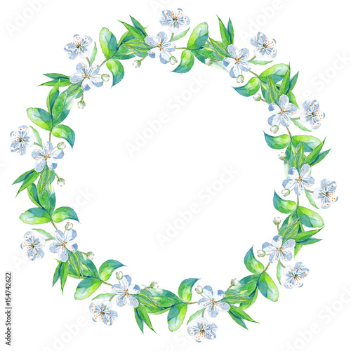 Wreath from cherry tree branches with flowers. 