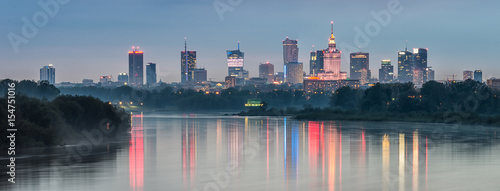 Night panorama of Warsaw skyline, Poland, over Vistula river in the night © tomeyk