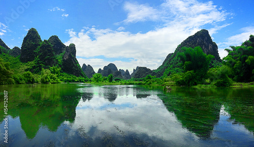 Jagged mountains of Yangzhou China reflecting in water