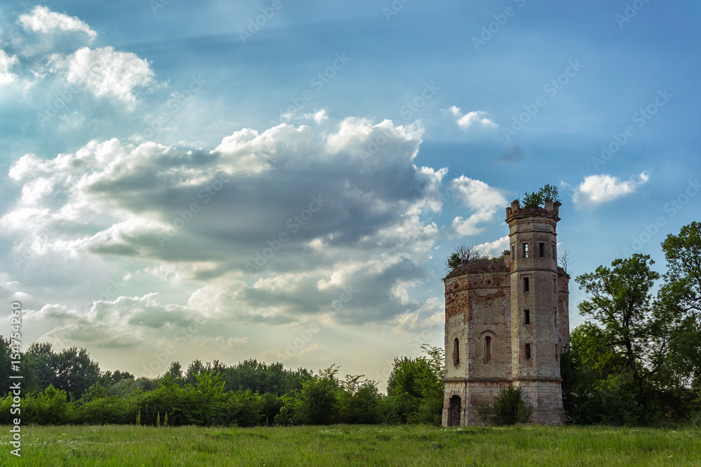 Abandoned tower with clouds 