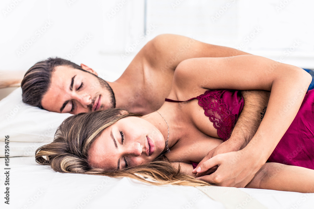 Fototapeta premium Couple sleep in bedroom