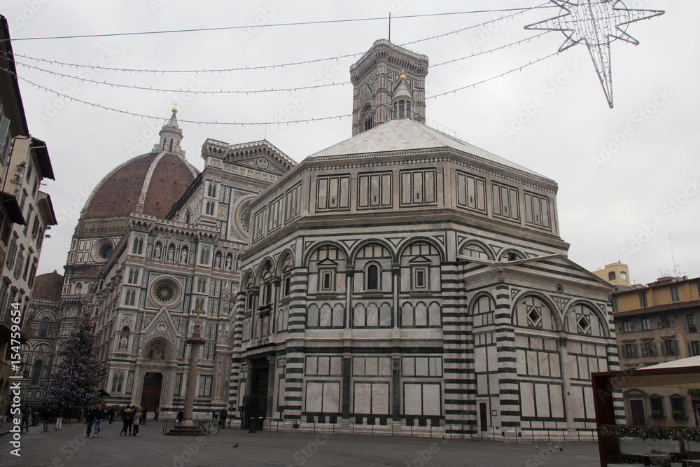 New Year Tree on Piazza del Duomo, Duomo Santa Maria del Fiore and Baptistery of Saint John. Florence, Italy.