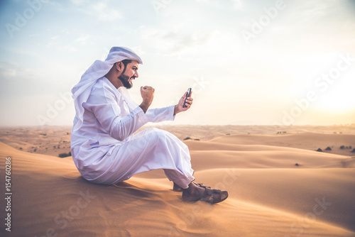 Arabic man in the desert © oneinchpunch