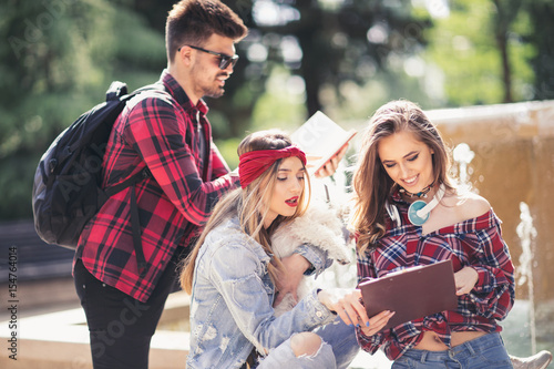 Group Of Students Chatting Together In Park © Mediteraneo