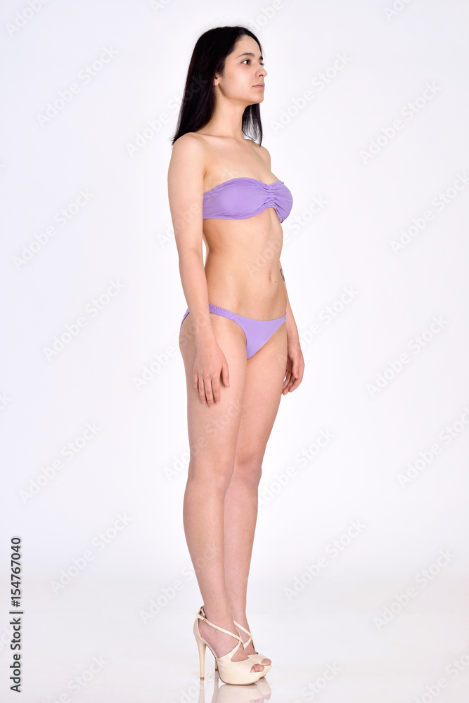 woman full length figure from three-quarters angle in underwear. woman full length figure from three-quarters angle in underwear.