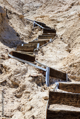 Wooden curved staircase leading to the top