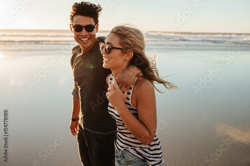 Man and woman on beach holiday