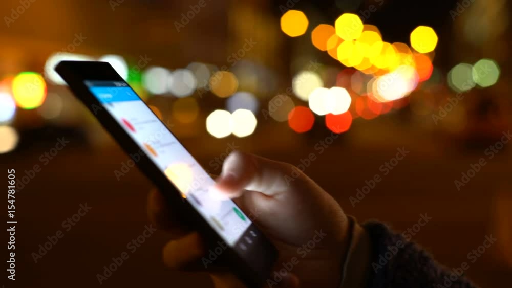 Midnight Girl Uses a Smart Phone Alse Good for a video background...More tags: aerial, blocks, cars, city, cross, downtown, drone, evening, from above, light, lights, trails, highway, hour, lapse, mo Midnight Girl Uses a Smart Phone Alse Good for a video background...More tags: aerial, blocks, cars, city, cross, downtown, drone, evening, from above, light, lights, trails, highway, hour, lapse, mo