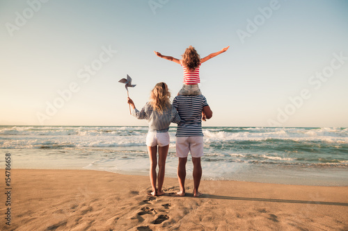Photography Happy family having fun on summer vacation