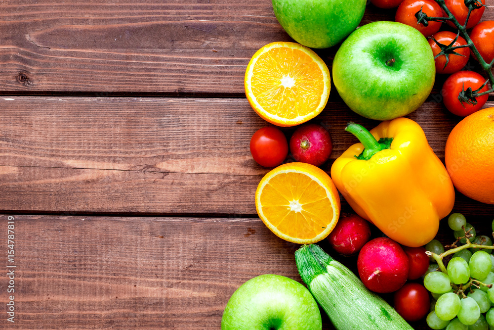 fruits and vegetables for healthy dinner on wooden background top view mock up fruits and vegetables for healthy dinner on wooden background top view mock up