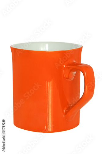 Orange ceramic tea cup isolated on white.