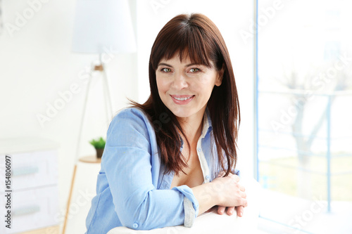 Beautiful mature woman at home Free Download Beautiful mature woman at home - GFXLoad